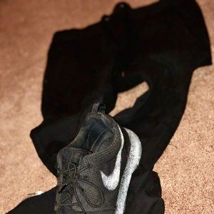 Black joggers with ankle zipper